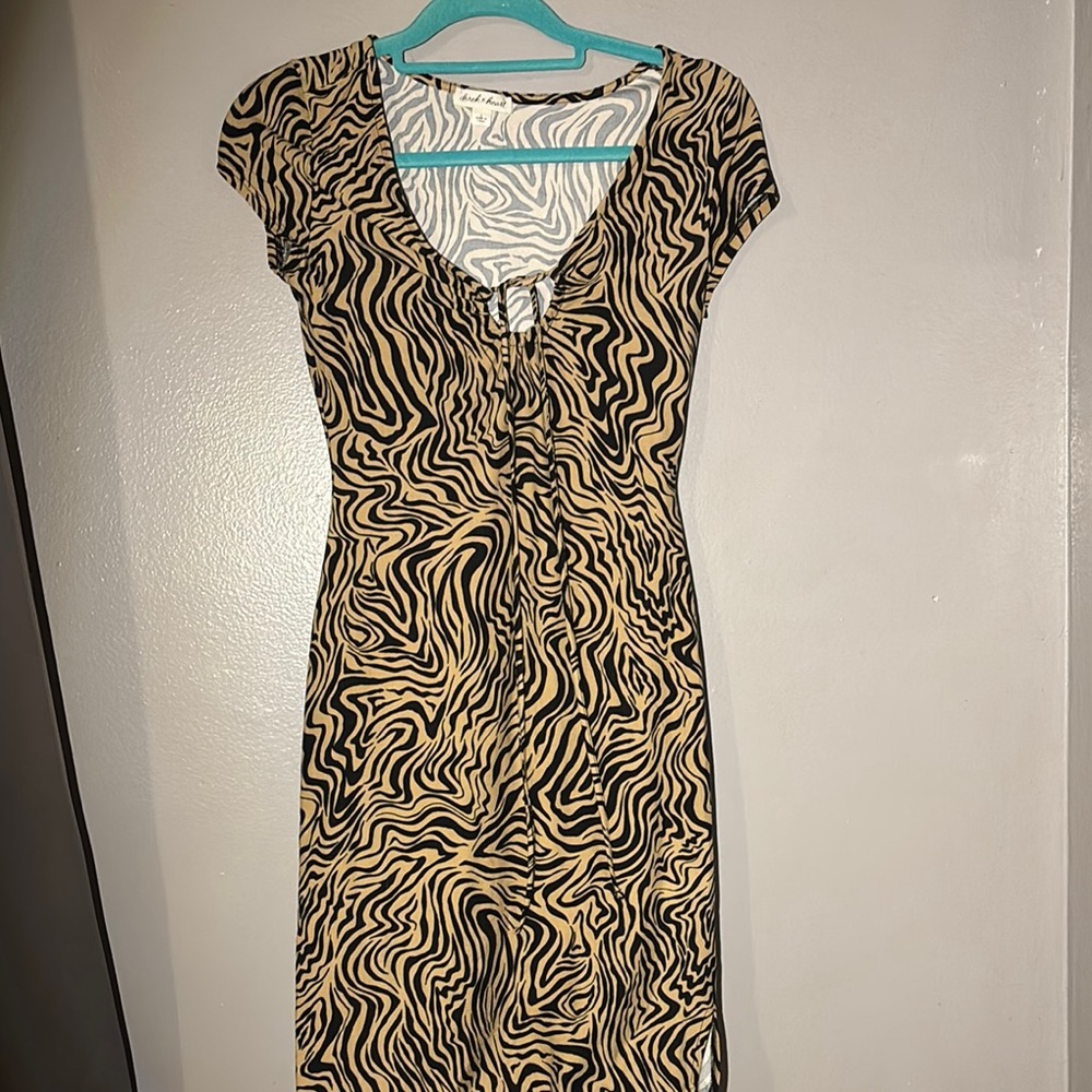Sexy comfortable dress it’s long & has a slit on the side